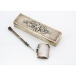 An Edwardian silver rectangular box by THH & Co, 15.5cm, 3.8ozt, together with a silver vesta case
