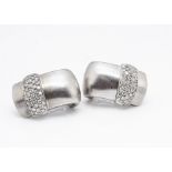 A pair of continental contemporary 18ct gold diamond and satin finish clip earrings, of
