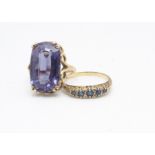 A five stone sapphire and diamond 9ct gold ring, with scroll gallery, ring size Q, 2.1g together