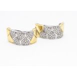 A pair of continental contemporary 18ct gold diamond encrusted clip earrings, the two colour gold