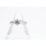 A certificated diamond solitaire, the platinum band and mount with a round brilliant cut diamond