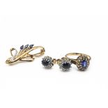 A suite of gem set jewellery, including a 9ct gold diamond and sapphire brooch, a pair of diamond
