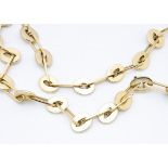 A contemporary continental 18ct gold dress necklace, the oval links alternating between flattened