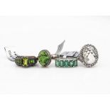 Four contemporary gem set silver dress rings, comprising a 'green amethyst' with topaz, ring size N,