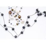 An opera length freshwater cultured pearl necklace, of various baroque, black, silver and white
