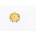 A George III gold third guinea, dated 1804, F-VF