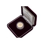 A modern Royal Mint UK Gold Proof £1 coin, dated 2005, in fitted box with certificate no. 0527, 19.