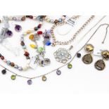 A collection of contemporary gem set silver jewellery, including earrings, necklaces, pearl