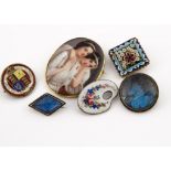 A small collection of 19th Century and later brooches, including a porcelain and gold oval