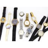 A group of eleven vintage and modern wristwatches, including a small trench style with mother of