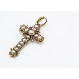 A late 19th/early 20th Century Italian gold ruby and seed pearl cross pendant, the graduated oval
