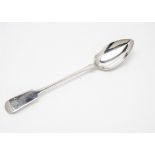 A William IV silver basting spoon by William Woodman, Exeter 1836, fiddle pattern with engraved