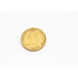 A Victorian full gold sovereign coin, dated 1894, VF