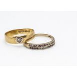 A 22ct gold diamond set wedding band, ring size Z, 4.9g and a 9ct gold ruby and eight cut diamond