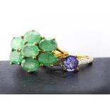 Two contemporary gem set gold rings, comprising a tanzanite and diamond dress ring, the circular