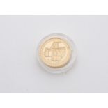 A modern Royal Mint gold one pound coin, dated 2003, marked Pattern with bridge, proof like, unc,