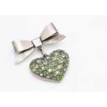 A sterling silver marked paste set heart and bow brooch, the chequered board green and colourless
