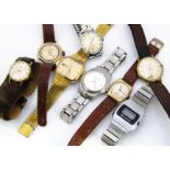 A collection of eight wristwatches, including a modern Bucherer quartz stainless steel, a 9ct gold