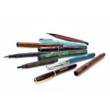 Six vintage fountain pens, including a Unique Pen, a Platignum, a Platignum Regal, a Mentmore,