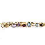 A collection of 9ct gold gem set rings, including an amethyst and diamond Art Deco example, ring