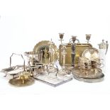 A collection of silver plate, including a pair of circular trays, glass and plated claret jug, an