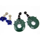 A pair of Angela Caputi Chinese style clip on plastic earrings, in green fleece pouch, 12cm,