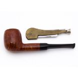 An unsmoked London briar straight pipe, of smooth, polished finish, with vulcanised mouth piece,