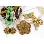 A large quantity of various early and late 20th Century costume jewels, including beads, brooches,