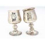 A pair of damaged 1980s silver commemorative goblets, celebrating the wedding of Charles & Diana,