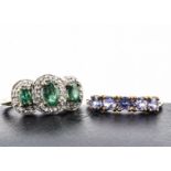 Two contemporary gem set rings, including a silver gilt emerald and white topaz triple cluster, ring
