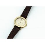 A c1980s Rolex Cellini 18ct gold cased lady's wristwatch, oval shaped case 26mm wide, gilt dial,