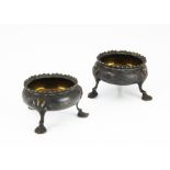 A pair of Victorian silver cauldron salts by WSCS, with three pad foot supports, 5.7ozt, heavily
