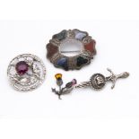 A small collection of Scottish silver jewellery, comprising a 19th Century agate Regard oval brooch,