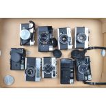 A Tray of Compact Cameras, a Konica C 35, EE Matic, C35, C35 EF3, Minolta Hi-Matic F, Hi-Matic