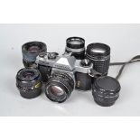 A Pentax KM SLR Camera, shutter working, body G, with SMC Pentax 55mm f/1.8 lens, elements G,