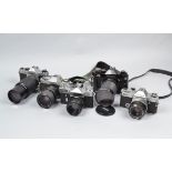 Five SLR Cameras, a Pentax K1000, with 70-200mm f/4 Pentax A zoom lens, Minolta X-370, with 35-
