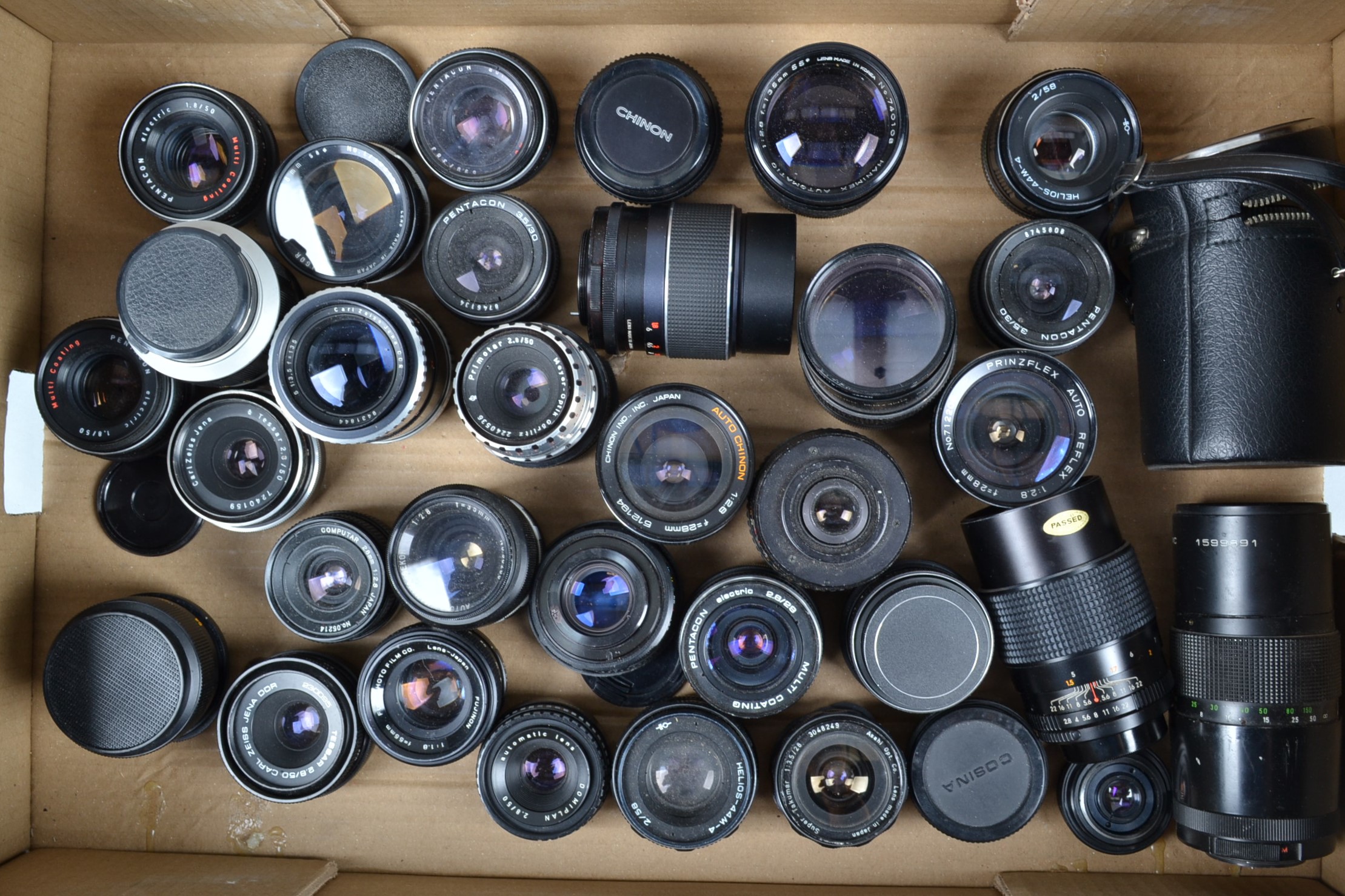 A Tray of M42 Mount Prime Lenses, various focal lengths, manufacturers include Pentagon, Carl
