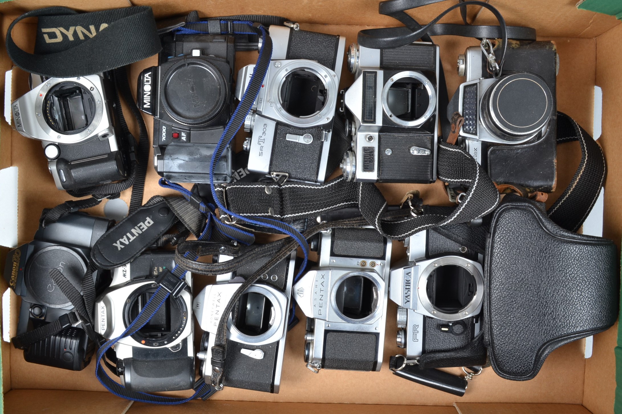 A Tray of 35mm SLR Camera Bodies, including a Canon T70, Minolta SRT30, Yashica FR, Honeywell Pentax