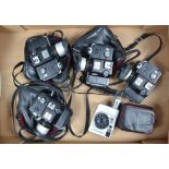 Minolta 110 Zoom SLR Cameras, four Minolta 110 Zoom SLR cameras, three in cases and a Canon Dial