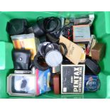 A Box of Camera Related Accessories, including light meters, filters, hoods, rings and other items