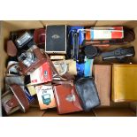 A Tray of Camera Accessories, including a Voigtländer Vitomatic II camera, flash units, tripod,