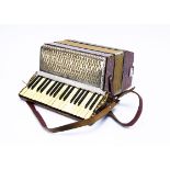 Hohner Accordion, a Hohner Regina IV accordion - 3 octave - 60 buttons - in tortoiseshell with brown