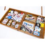 Radio Station Pin Badges and case, a small wooden case with sliding covers that contains