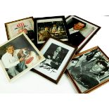 Film / TV star photos, six framed and glazed photos comprising Roger Moore (2), Pierce Brosnan,
