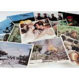 Roger Moore Film Stills, set of eight colour stills for both The Wild Geese and Gold and seven for