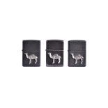 A Camel Belt Buckle Zippo Lighter, without the buckle, with raised white metal camel on midnight