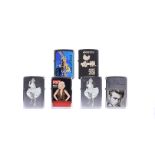 Six Entertainment-Related Zippo Lighters, one with sax artwork by Richard Wallich, Woodstock,