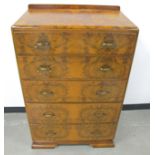 A 20th Century walnut chest, of five graduated drawers with burr walnut top and drawer fronts,