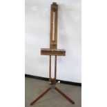 A mid Century artist's easel, with aluminium fittings, having some repair on a tripod support,