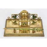 An Irish enamel and brass inkstand, with shamrock motifs, 14.5cm x 21.5cm